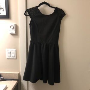 Black party dress with gold beading on sleeves